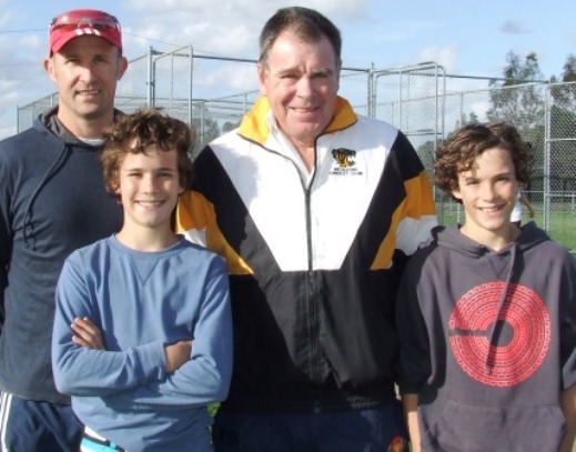 *Special tips from a special cricketer: L-R Matt Hogg with sons Archie and Charlie, with former Test bowler Jim Higgs.